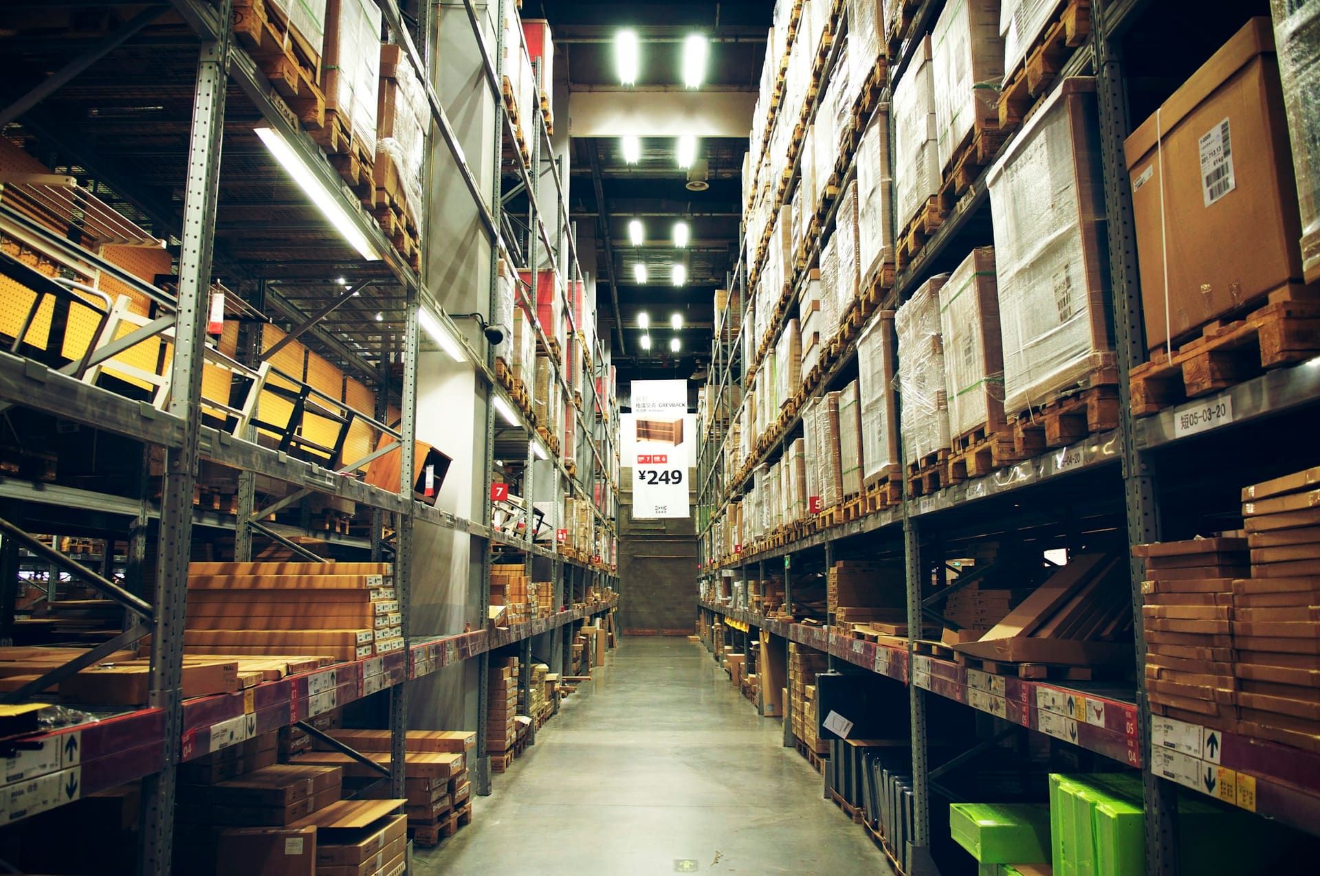 Organised building supplies in a materials warehouse, used as contact page context imagery.