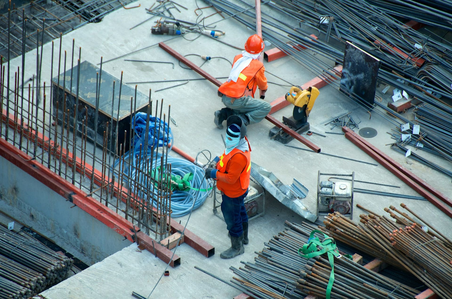 Construction materials grouped by type in a storage area, used as context imagery for construction materials supply.
