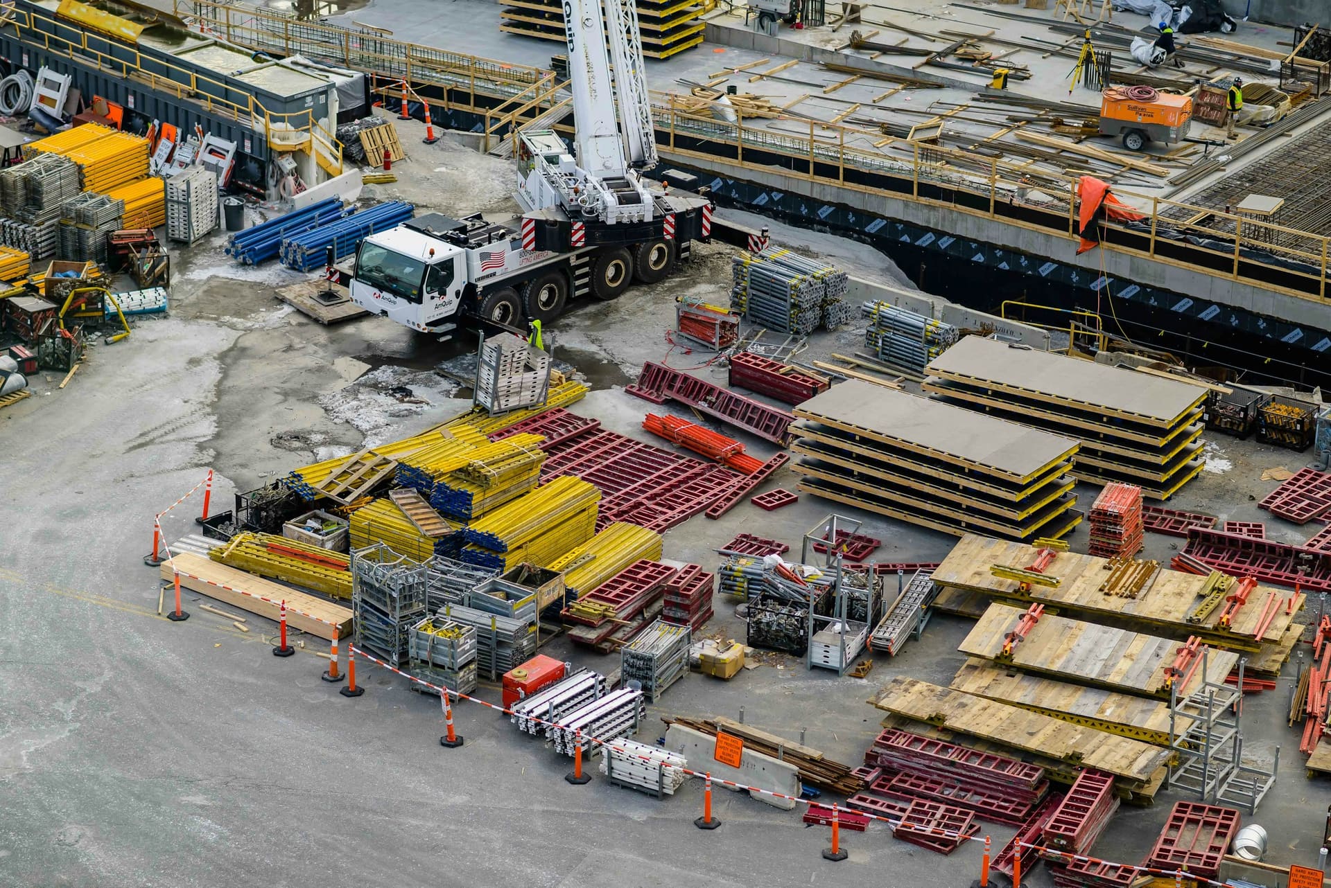 Materials set down at a construction work area, used as contractor supply context imagery.